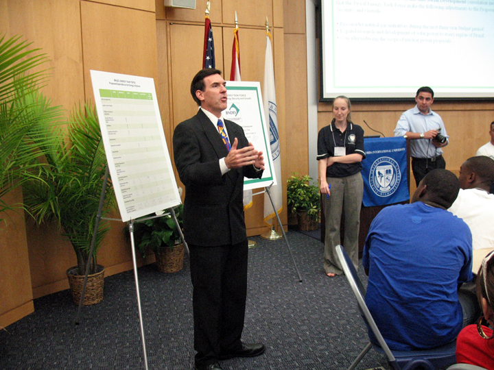 Dr. Keith Astuto, in the role of Brazilian President Luiz Inacio Lula da Silva, addresses the final negotiation session of FIU’s Summer Institute for National Security Studies.