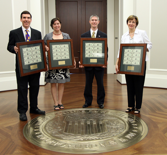 PHOTO CAPTION: Dr. Astuto (far left) and other finalists stand outside the board room at the Sixth District Federal Reserve Bank in Atlanta after the award ceremony.